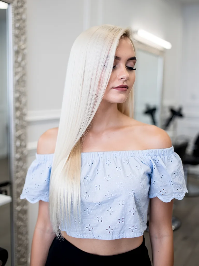 Platinum Blonde Blunt Cut with Side-Swept Bangs